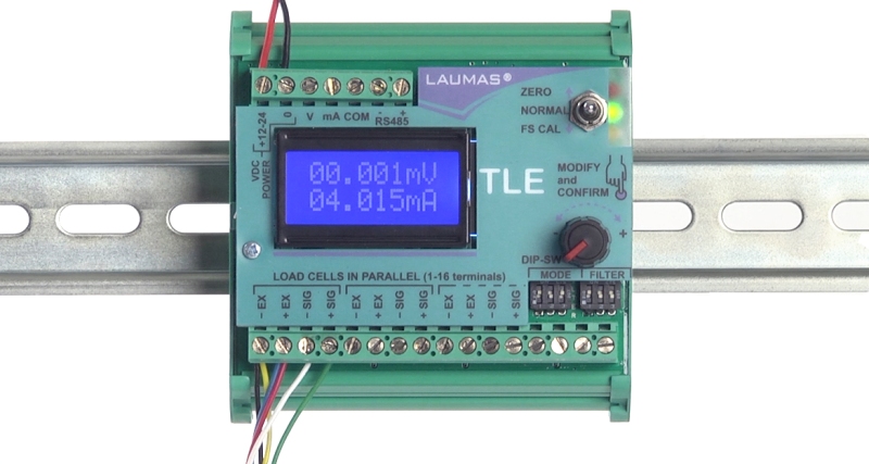 TLE weight transmitter on Omega/DIN rail for back panel mounting.