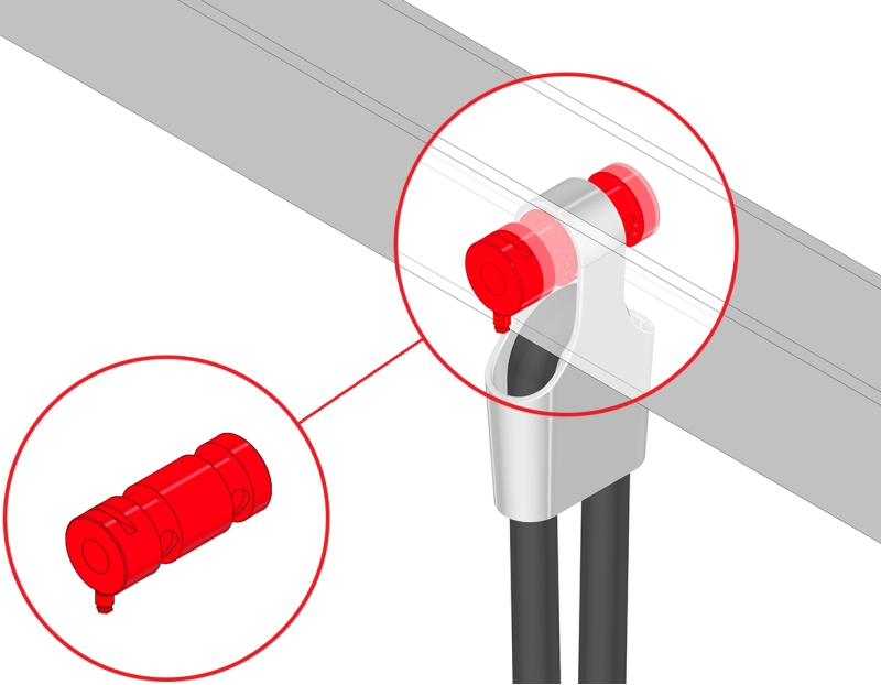 Axe dynamométrique LAUMAS pour pesage et limitation de la charge sur pont roulant : le capteur est installé à la place de l’axe existant au point fixe d’où part le câble en acier.